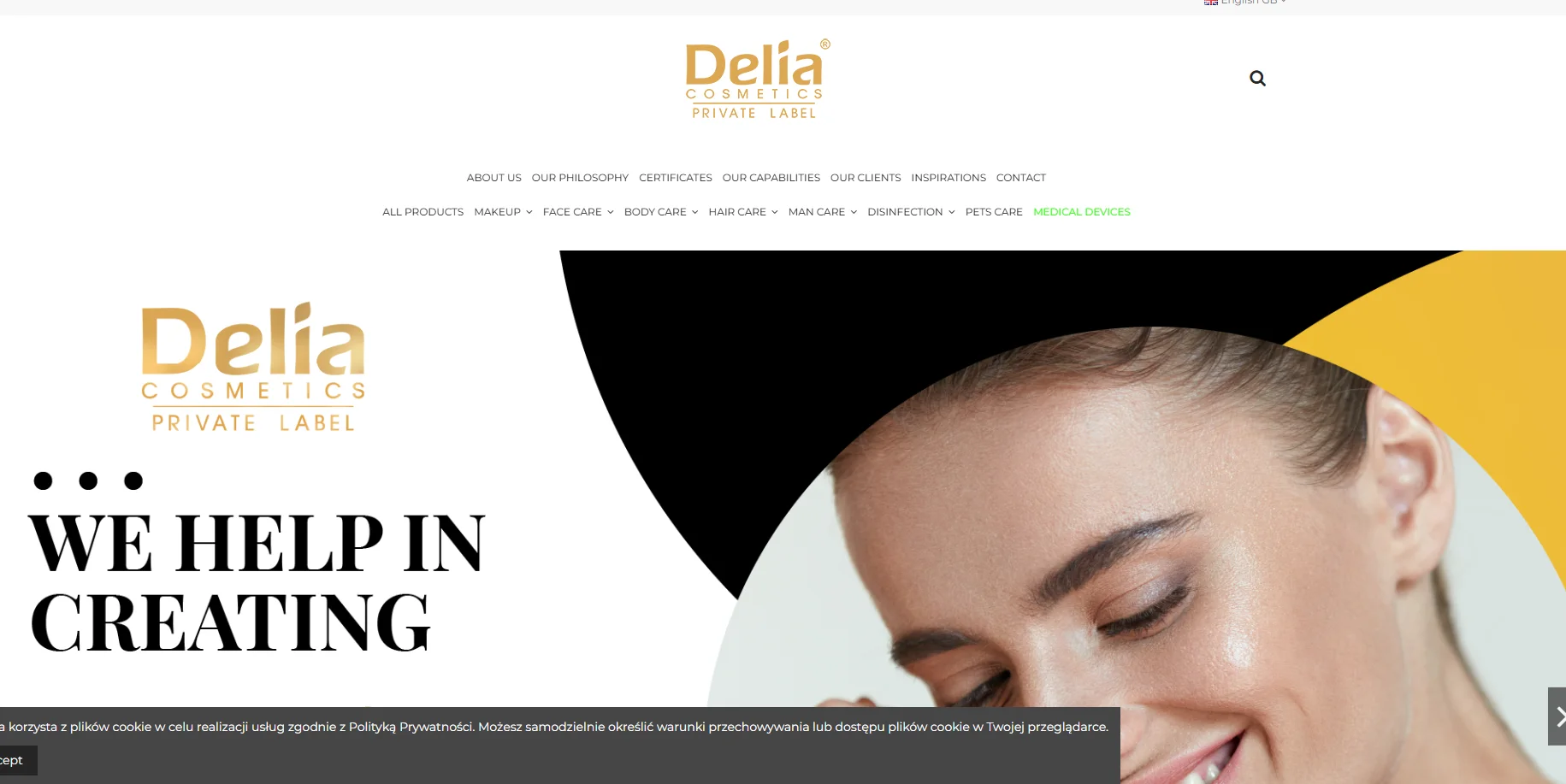 Delia Cosmetics website homepage featuring brand logo and navigation menu with blurred section of a face.